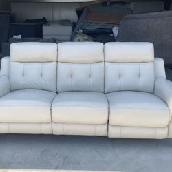 LEATHER POWER RECLINING SOFA WITH POWER HEADREST 