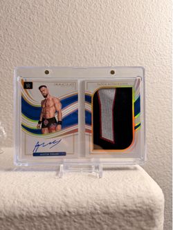 Austin Theory WWE Patch Auto Book Card 4/10