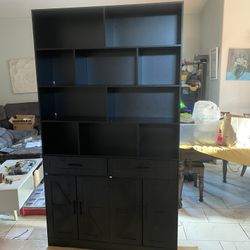 tall farmhouse-style storage cabinet