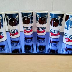 "Collector:  OREO COOKIE  Dunk Glasses
by NABISCO"
 1970's