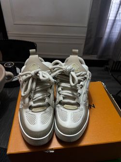 tan lv skates , size 42 slightly worn