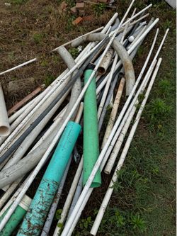 Large pile of new left over pipes