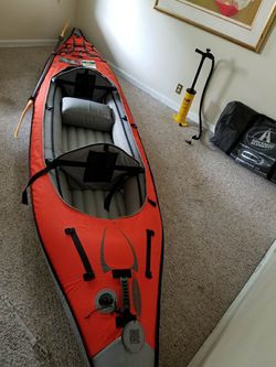 Kayak converts into Paddleboard, includes pump, travel bag, cover and paddles! See description attached