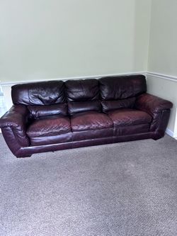 Leather couch and rocker chair