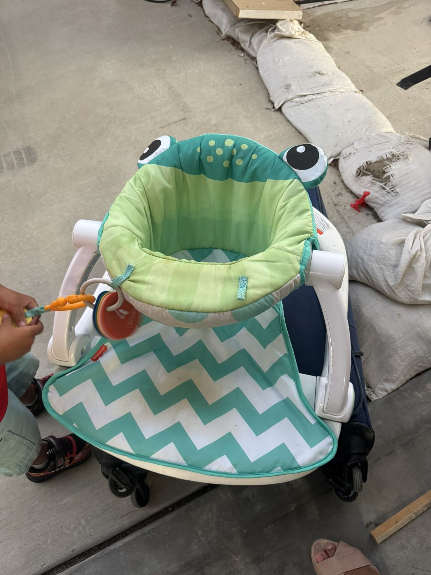 Frog Sitting & Playing For Baby