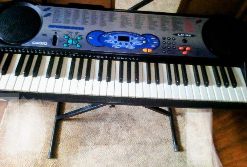Casio Electric Keyboard and Stand