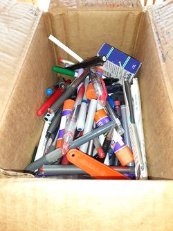 1 box of pens pencils glue sticks tape