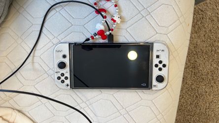 NEW Nintendo switch OLED White + games + accessoires