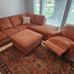 Sectional, Rocker/Recliner, Ottoman, & Rug