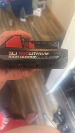 Milwaukee charger for m12 /m18 with - 1 -     3.0 m18 red lithium battery