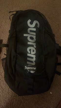 Black Supreme Backpack And Orange Moncler
