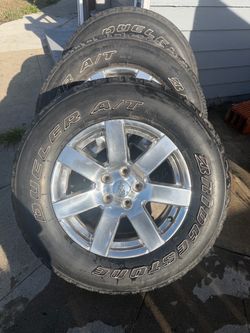 Bridgestone Dueler A/T Tires with Jeep 18" Chrome Wheels - P255/70R18