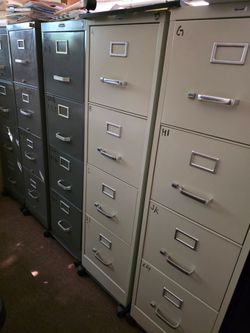 4-Drawer Metal File Cabinets on Casters – $50 Each