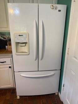 Maytag Refrigerator with water and ice dispenser. Everything works