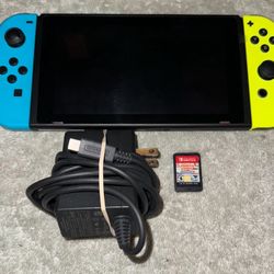NINTENDO SWITCH HANDHELD CONSOLE WITH VIDEO GAME & CHARGER