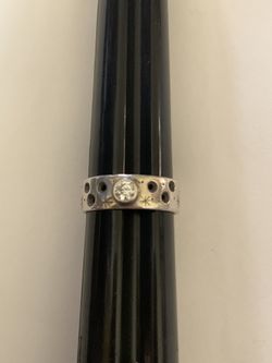 Unmarked silver ring with a diamond? CZ? (Unsure of gem) size 7