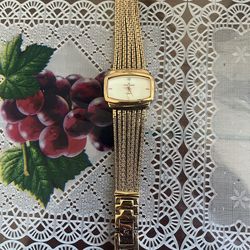 Anne Klein Women's 107208SVGB Diamond Accented Gold-Tone Bracelet Watch