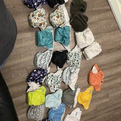 (21) Reusable Diapers With (32) Inserts Like New.