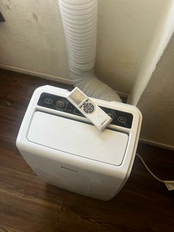 Shinco portable air conditioner with hose and window thing,