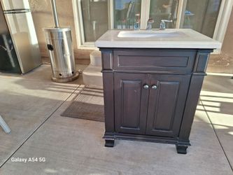 Bathroom sink and cabinet