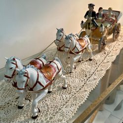 Elegant Hand-Painted Porcelain Horse-Drawn Carriage Figurine. 