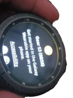 Samsung Gear S3 Frontier SM-R760 smartwatch with charging dock