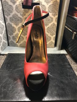 Bright pink suede open toe heels