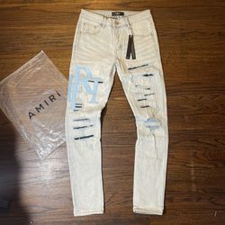Amiri BBlue Staggered Logo Denim Jeans