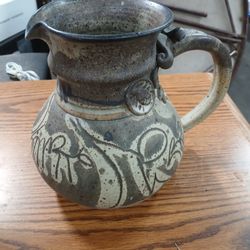 Hand made picture with artist's signature.