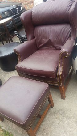 Burgundy leather chair and ottoman