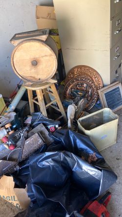 One dollar and up sale boxes look through all kinds of knickknacks finish stuff who knows trying to keep clean out my dad’s garage