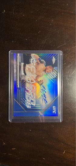 a 2026 Topps Chrome UFC Khabib Nurmagomedov auto blue refractor /150