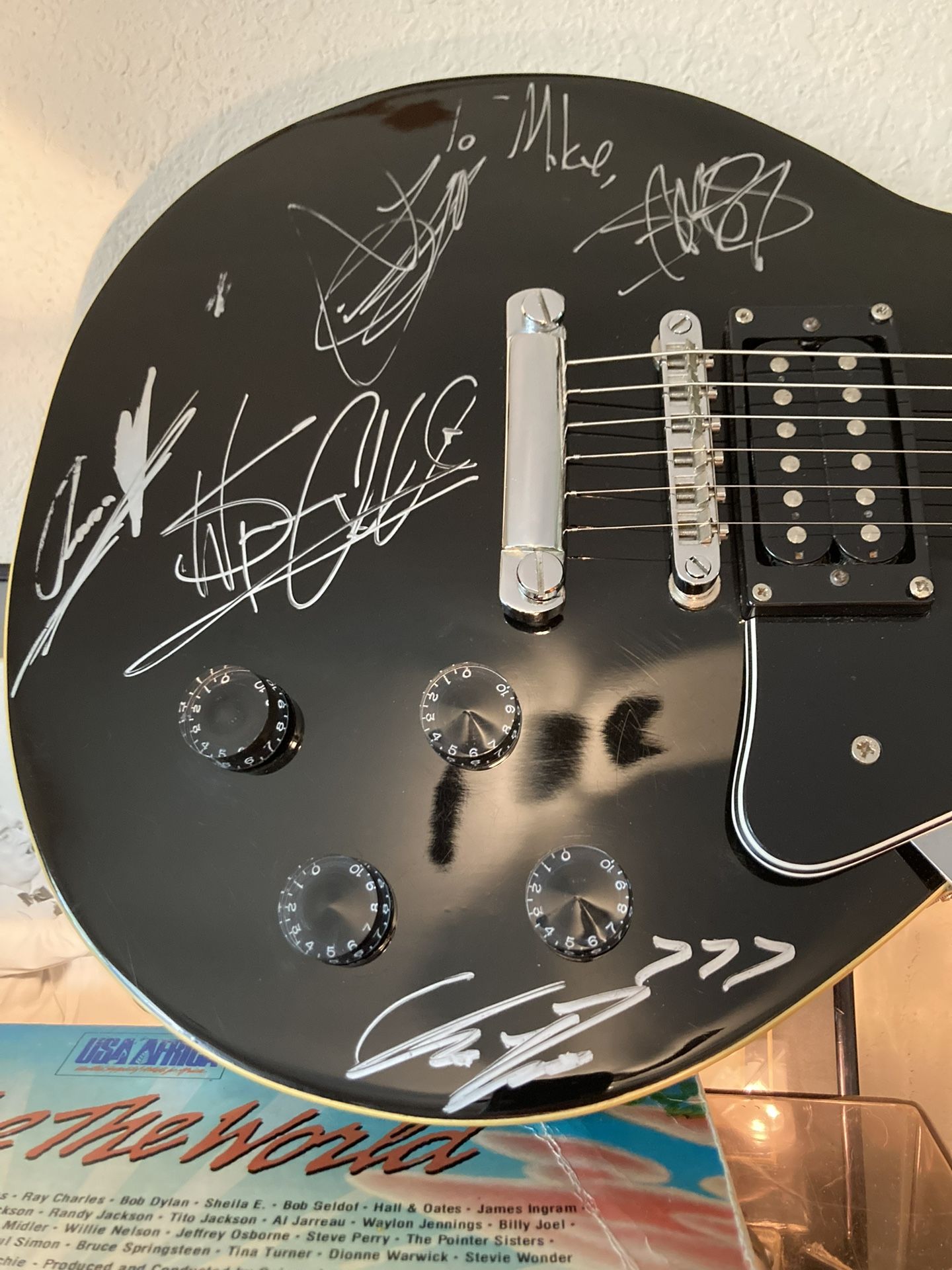 Underoath Autographed Kay Vintage Series Electric Guitar. This guitar was hand signed by all members of the band Underoath at record store 