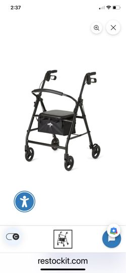 Black Walker with Seat. New. Never out of box.