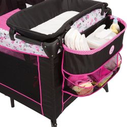 Disney Baby Sweet Wonder Playard, Foldable Baby Playpen: With Newborn Bassinet, Toy Arch, and Carry Bag, Mesh ,Minnie Garden Delight


