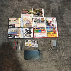  Nintendo 3ds Xl Gray. Comes With 8 Games 4 Stylus Pens Charger And Five Cases.