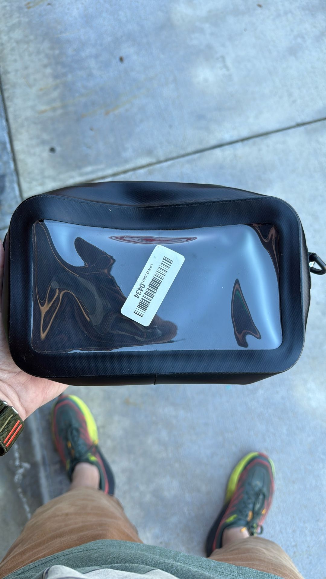 Waterproof Sling Bag with Phone Touch Screen Feature