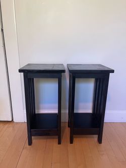 Black wooden side tables
