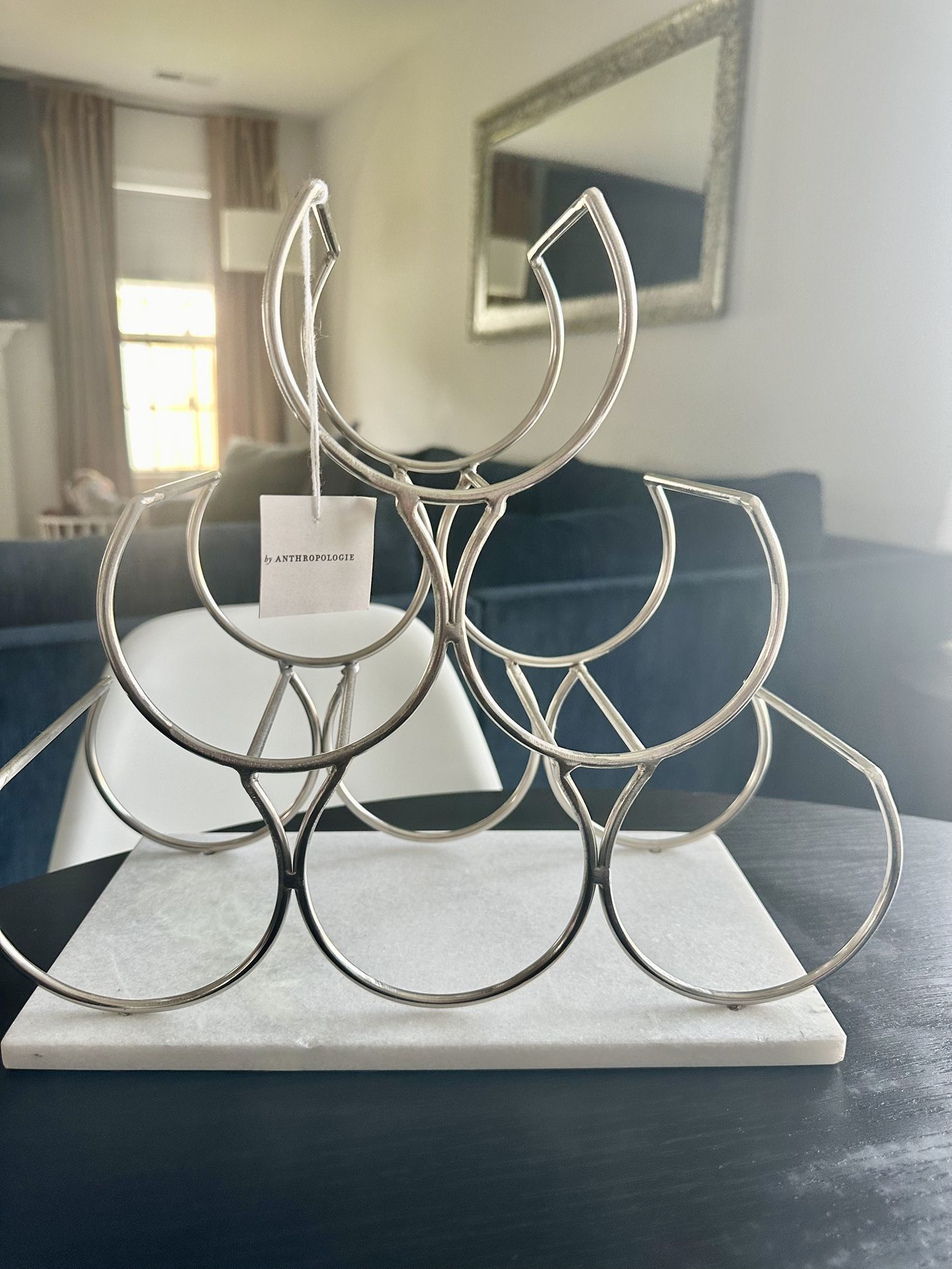 $40 Anthropologie Wine rack featuring a white marble base.