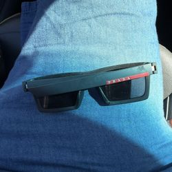 Prada polarized Dark Shades 