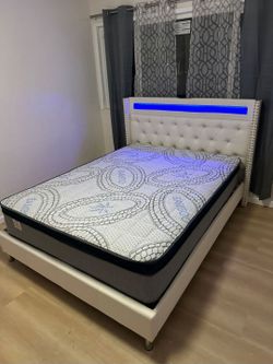 NEW QUEEN BED FRAME AND MATTRESS