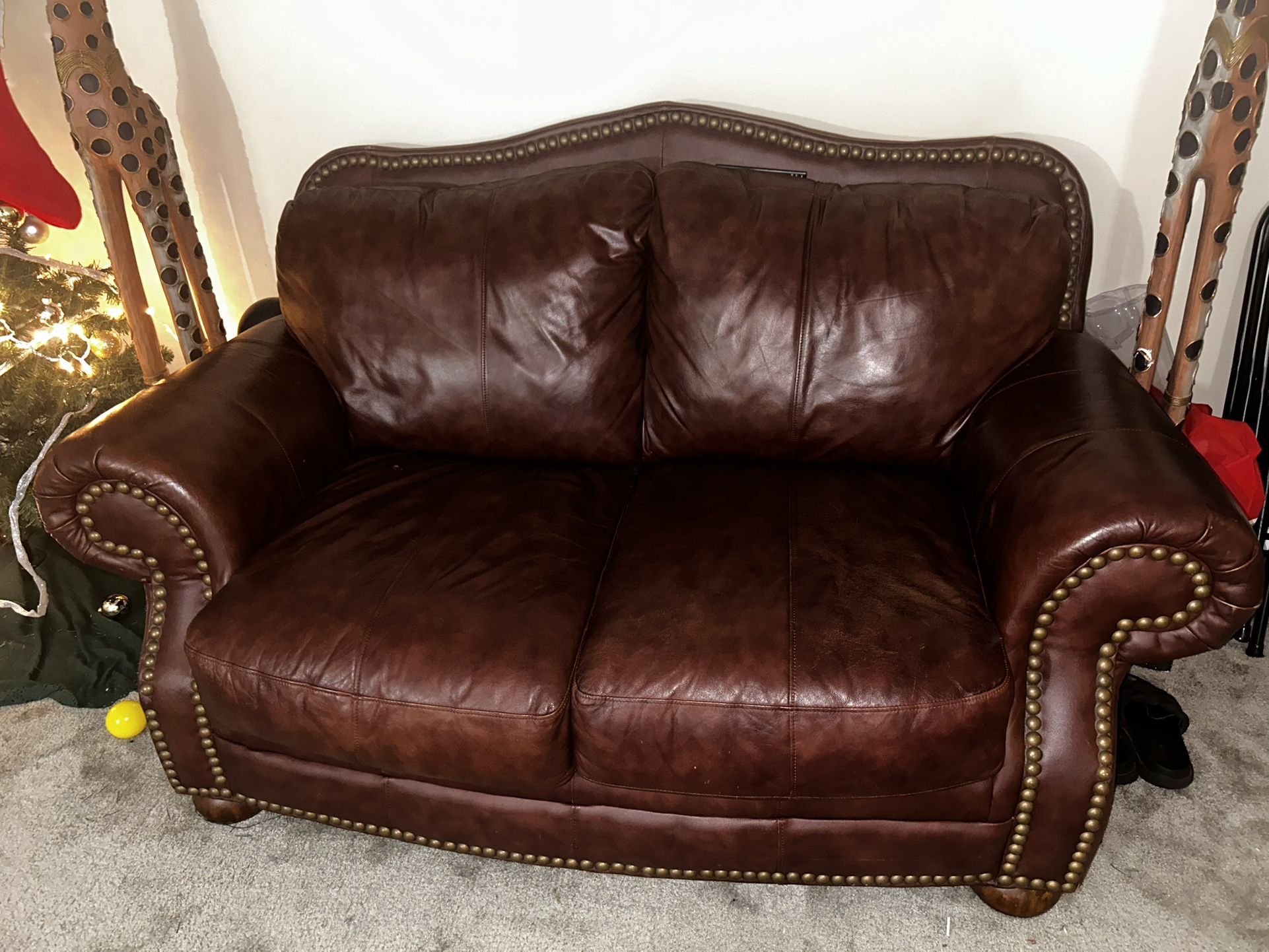 red leather couches , love seat & single seat