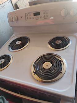 NEW GE WHITE ELECTRIC STOVE