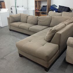 Large brown sectional couch