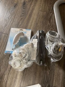 Nintendo Wii with accessories + 15 games
