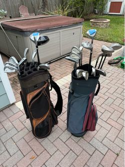 (2) mens complete golf club sets with golf bags $100 each