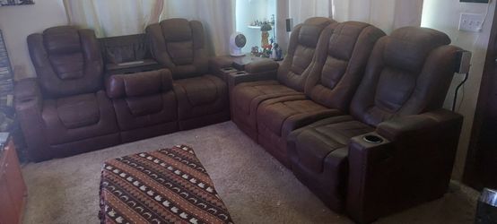 Reclining 3 seat Couch x2 with charging capability and storage $600  each or OBO