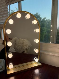 Brass vanity mirror