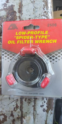A, LOW PROFILE SPIDER -TYPE OIL FILTER WRENCH