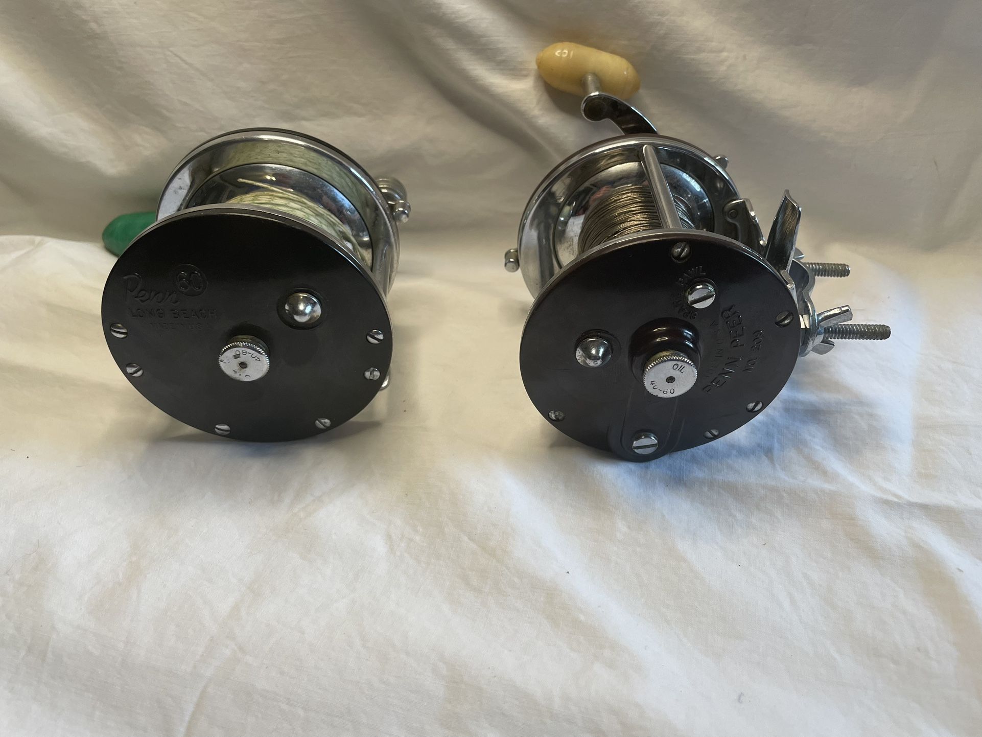 2Ea. Penn reels, Penn Peer 209, & Penn Long Beach 60